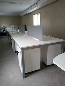 Shared l-shaped desk