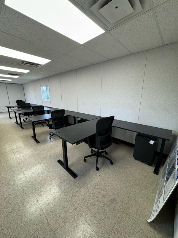 Sit-to-stand l-shaped desk