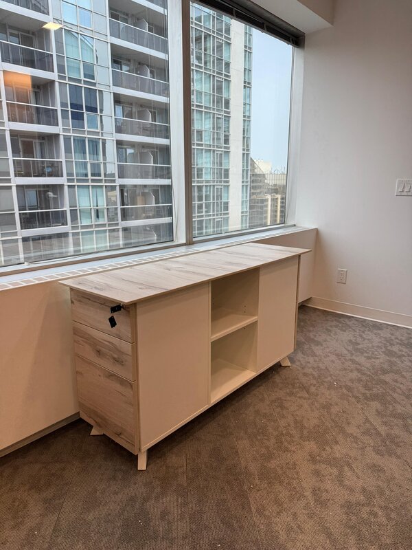 Modern cabinet with drawers and shelf